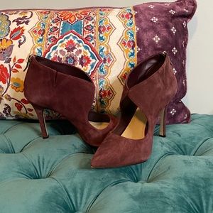 Burgundy suede heels.